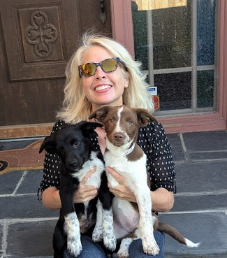 Jeannie with foster puppies